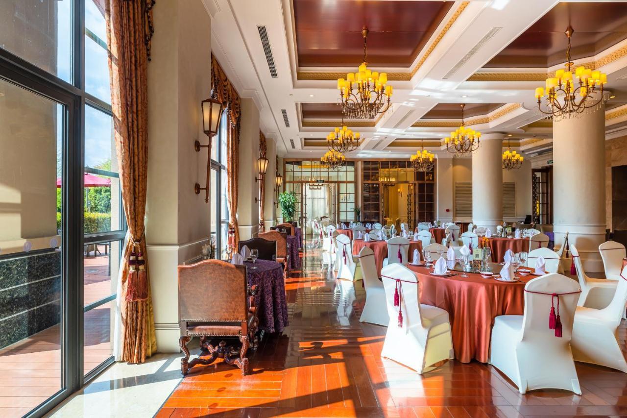 ยัวเวิล์ดอินเตอร์เนชั่นแนลคอนเฟเรนซ์เซนเตอร์ Hotel อี้วู ภายนอก รูปภาพ
